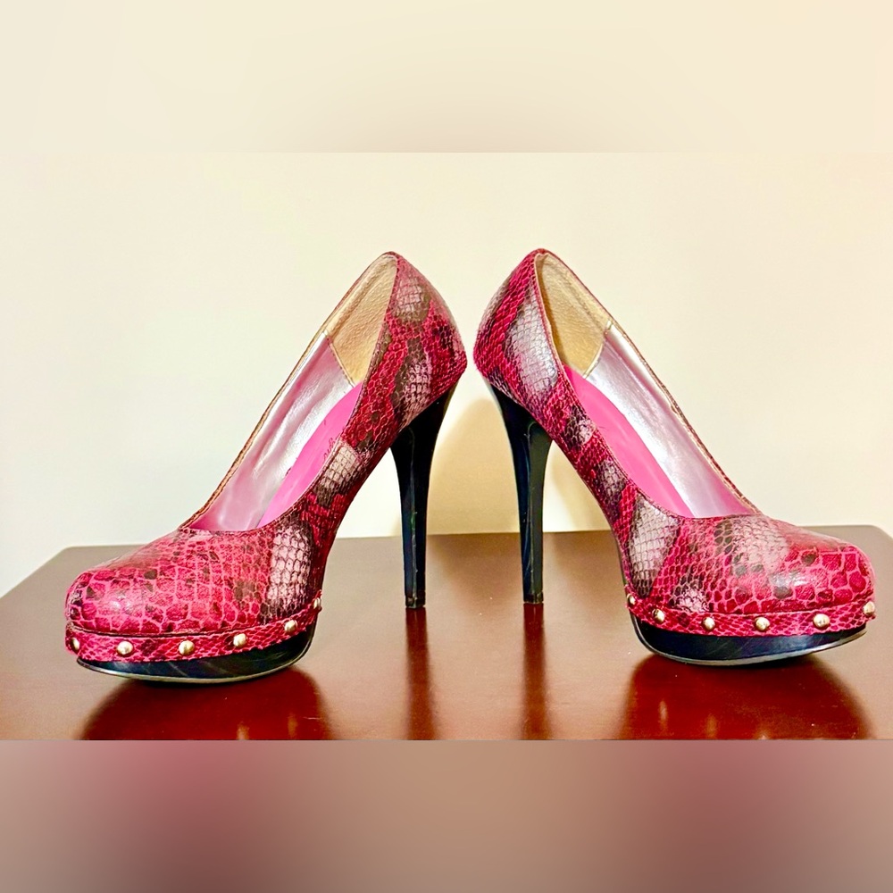 Pinks snakeskin stiletto heels.  Gently used. Size 6.5. Studded.  Gorgeous!
